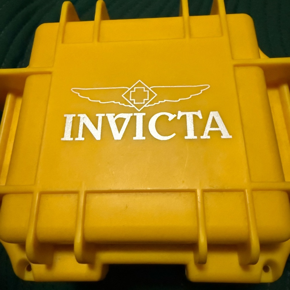 Invicta Yellow Watch case and watches inside